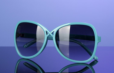 Fashionable women's blue sunglasses