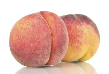 ripe peaches isolated on white.