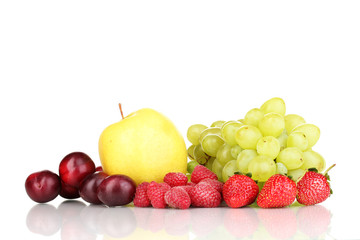 Mix of ripe sweet fruits and berries isolated on white