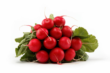 Healthy food. Bunch of fresh radishes on a white background.