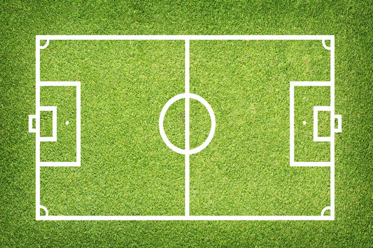 Soccer football on grass field