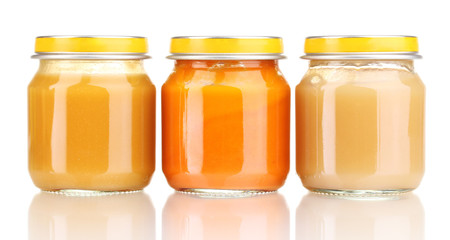 Jars of baby puree isolated on white
