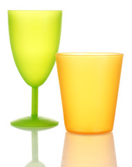 Bright plastic tableware isolated on white