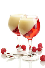 fruit jelly with raspberries in glasses isolated on white