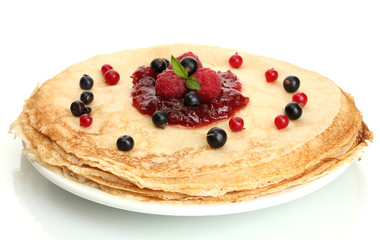 Delicious pancakes with berries and jam