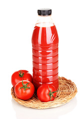 Tomato juice in bottle on wicker mat isolated on white