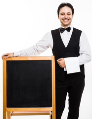 Waiter showing a blackboard