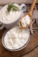 cottage cheese in a plate and a spoon with cottage cheese