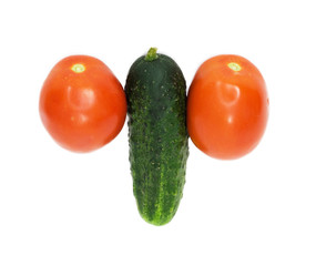 two tomatoes were insulated and one cucumber on white