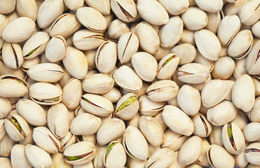 Healthy food, background. Shelled pistachios