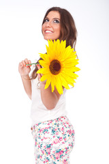 woman holding a sunflower