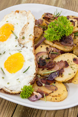 Fried Egg on a heap of roasted Potatoes