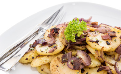 Plate with fried Potatoes on white