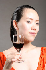 The girl in the open red wine