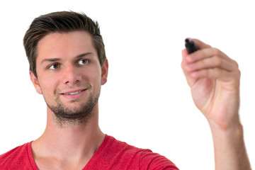 Young man writing with permanent marker