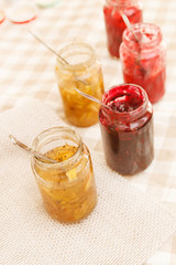 different jars full of fruity jam