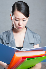 bright picture of beautiful woman with folders