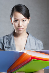bright picture of beautiful woman with folders