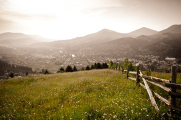 View from the mountains meadow to the village