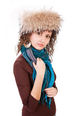 portrait of a pretty girl in a fur hat