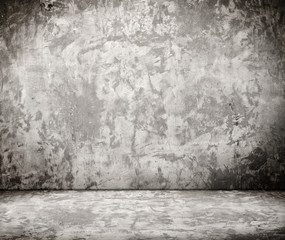 room with grunge concrete wall, cement floor