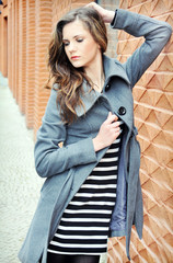 Portrait of the beautiful young woman with long hair