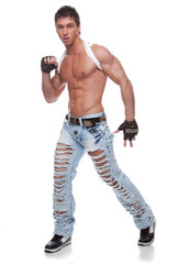 Muscular sexy naked man in blue jeans