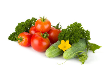 Ripe tomatoes, cucumbers and parsley