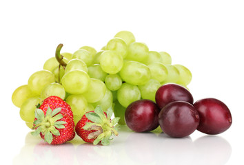 Mix of ripe sweet fruits and berries isolated on white