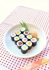 Hosomaki sushi  tuna, smoked salmon and vegetables inside