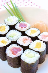 Hosomaki sushi  tuna, smoked salmon and vegetables inside