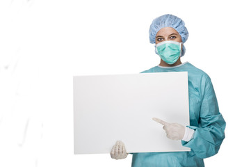 OP Ärztin mit Schutzkleidung und Werbeplakat