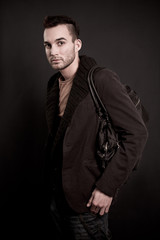 Obraz premium fashion portrait of the young beautiful man - colorized photo