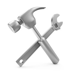 Adjustable Wrench and Hammer on white background