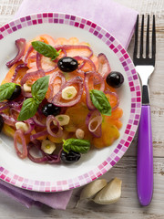 salad with ox heart tomatoes, onions olives and garlic