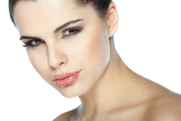 portrait of sexual beautiful brunette with lips, sprinkled sugar