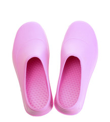 bright pink galoshes isolated on white