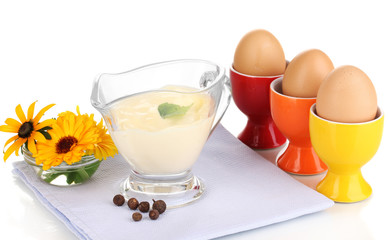 Mayonnaise in bowl on napkin isolated on white