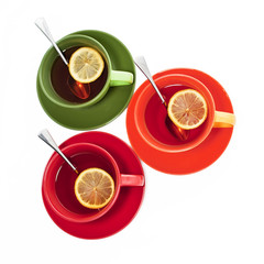 Three colored tea cups
