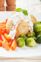 Jacket potato with cream sauce
