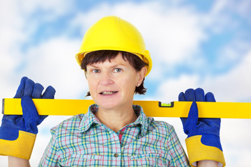 Construction worker with level
