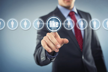 Man with Touchscreen push LIKE