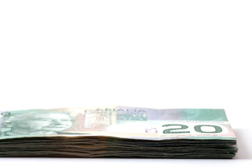 A stack of 20 Canadian dollars bills