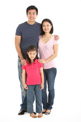 Full Length Studio Shot Of Chinese Family