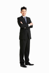 Full Length Studio Portrait Of Chinese Businessman