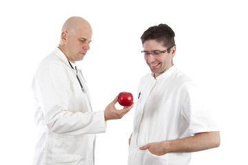 Doctors with red apple