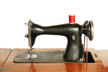 Vintage sewing machine isolated on white background