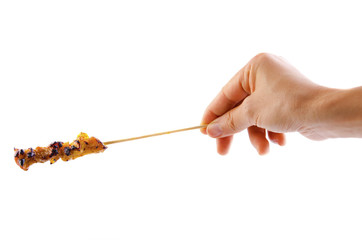 hand with satay