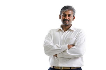 Good looking mature Asian Indian male with business suit isolate