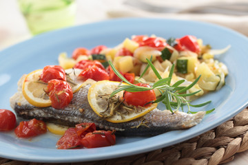 Baked sea bass with vegetables